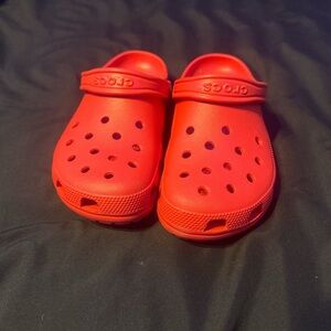 im selling red crocs in a size 8